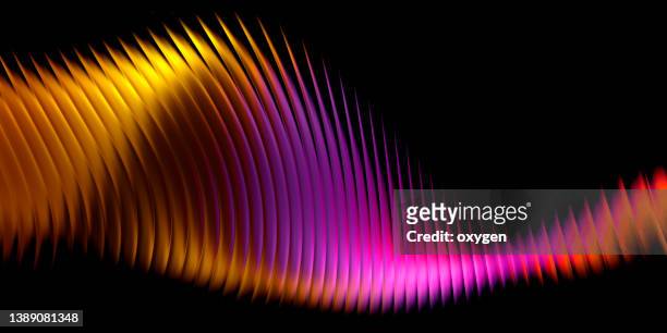 abstract  swirl striped wave yellow pink magical neon transparent ribbon lines on black background. energy streams - black colour 個照片及圖片檔