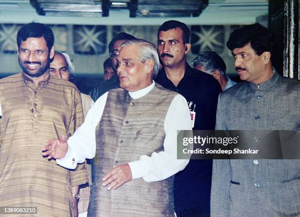 Prime Minister Atal Behari Vajpayee with NDA partner Ram Vilas Paswan and BJP General Secretary Pramod Mahajan in New Delhi.