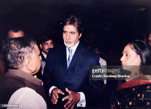 Bollywood superstar Amitabh Bachchan with wife Jaya, a former actor turned politician, speaking with Samajwadi Party president Mulayam Singh Yadav in...