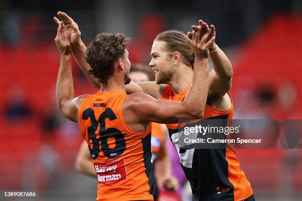 Harry Himmelberg of the Giants celebrates kicking a goal during the round three AFL match between the Greater Western Sydney Giants and the Gold...