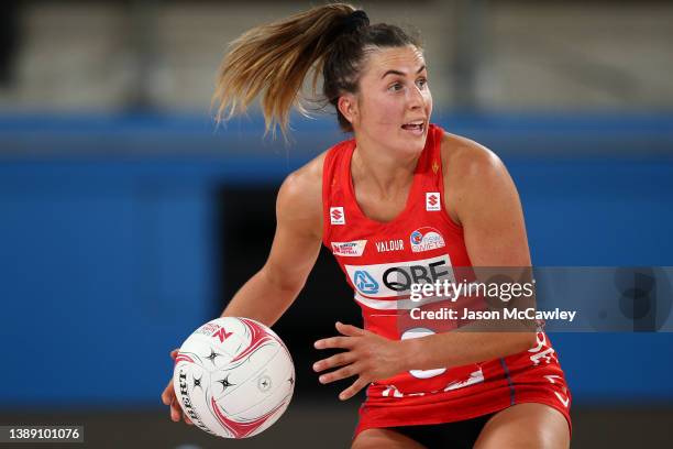 Maddy Proud of the Swifts looks to pass during the round two Super Netball match between Sydney Swifts and Melbourne Vixens at Ken Rosewall Arena on...