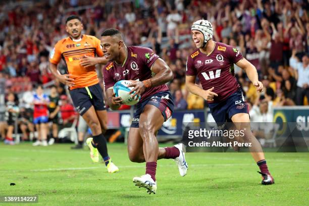 Filipo Daugunu of the Reds scores a try during the round seven Super Rugby Pacific match between the Queensland Reds and the ACT Brumbies at Suncorp...