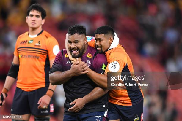 Taniela Tupou of the Reds and Folau Fainga'a of the Brumbies are seen together after the round seven Super Rugby Pacific match between the Queensland...