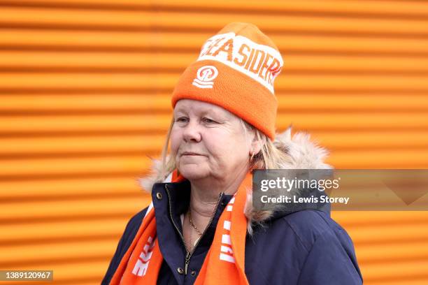 Fan of Blackpool arrives at the stadium prior to the Sky Bet Championship match between Blackpool and Nottingham Forest at Bloomfield Road on April...