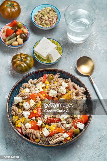 summer wholemeal pasta salad - wholegrain pasta stock pictures, royalty-free photos & images