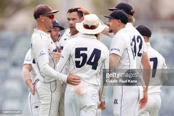 Scott Boland of Victoria celebrates the wicket of Cameron Bancroft of Western Australia during day three of the Sheffield Shield Final match between...