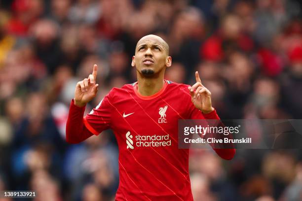 Fabinho of Liverpool celebrates after scoring their team's second goal from the penalty spo during the Premier League match between Liverpool and...