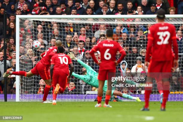 Ben Foster of Watford FC fails to save a penalty shot from Fabinho of Liverpool which results in the second goal for Liverpool during the Premier...