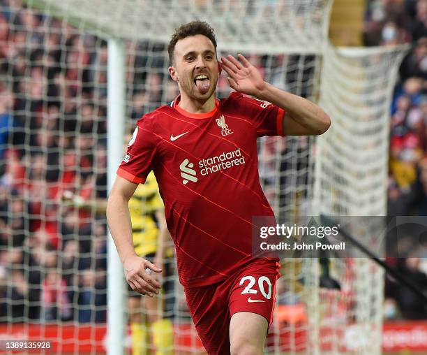 Diogo Jota of Liverpool celebrates after scoring the opening goal during the Premier League match between Liverpool and Watford at Anfield on April...