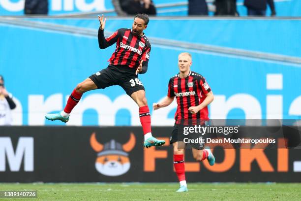 Karim Bellarabi of Bayer 04 Leverkusen celebrates after scoring their side's second goal during the Bundesliga match between Bayer 04 Leverkusen and...