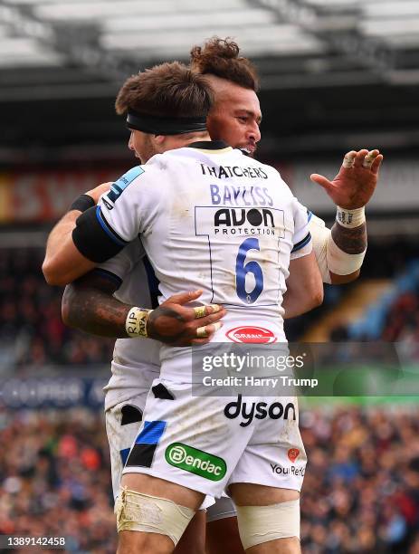 Josh Bayliss of Bath Rugby celebrates their sides second try with team mate Nathan Hughes during the Gallagher Premiership Rugby match between Exeter...