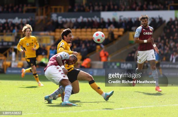 Ashley Young of Aston Villa scores an own goal during the Premier League match between Wolverhampton Wanderers and Aston Villa at Molineux on April...