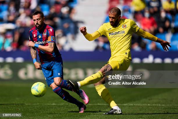 Etienne Capoue of Villarreal CF being followed by Jose Luis Morales of Levante UD during the LaLiga Santander match between Levante UD and Villarreal...