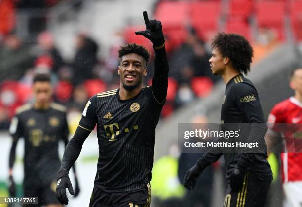 Kingsley Coman of FC Bayern Muenchen celebrates after scoring their team's third goal during the Bundesliga match between Sport-Club Freiburg and FC...