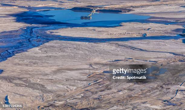 aerial view ft mcmurray tailing ponds alberta canada - waste wealth stock pictures, royalty-free photos & images