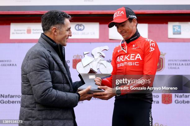 Miguel Induráin of Spain Ex-procyclist and 5 times winner of Tour de France and hands out a trophy to Warren Barguil of France and Team Arkéa -...