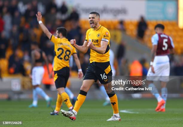 Conor Coady of Wolverhampton Wanderers celebrates at the full time whistle after the Premier League match between Wolverhampton Wanderers and Aston...