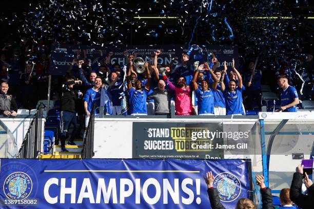 Macclesfield FC players lift the North West Counties Premier Division trophy after the North West Counties Football League match between Macclesfield...