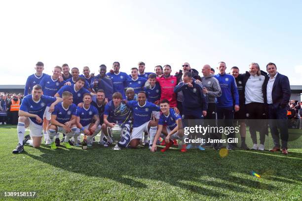 Macclesfield FC players pose with the North West Counties Premier Division trophy after the North West Counties Football League match between...