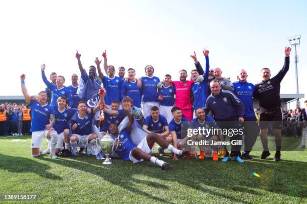 Macclesfield FC players pose with the North West Counties Premier Division trophy after the North West Counties Football League match between...