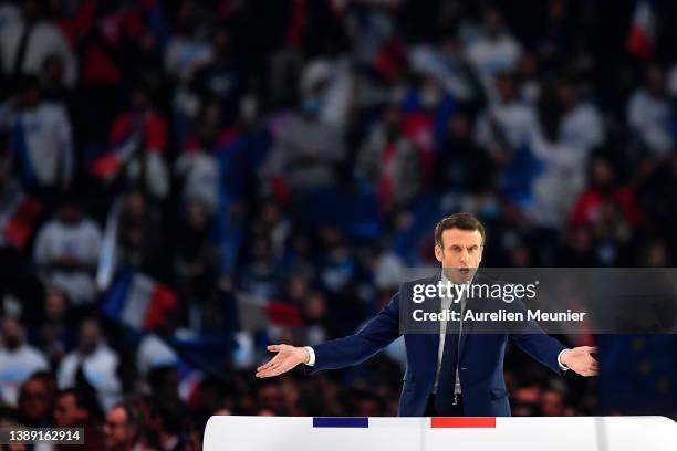 Emmanuel Macron adresses voters during a political meeting at Le Defense Arena on April 02, 2022 in Paris, France. On Sunday April 10 and 24 47.9...