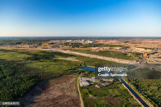 aerial ft mcmurray surface mining oilsands alberta canada - fort mcmurray stock pictures, royalty-free photos & images