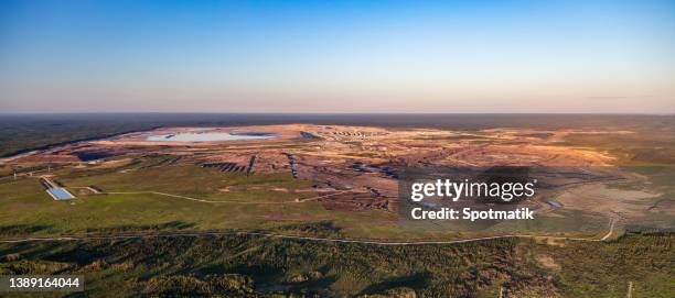 aerial panoramic open pit surface mining for oilsands - fort mcmurray stock pictures, royalty-free photos & images