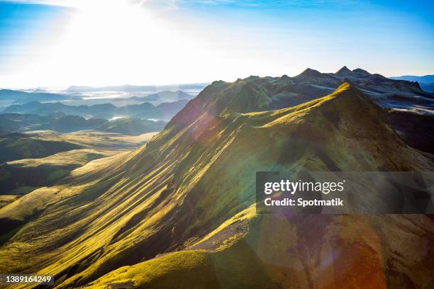 aerial sunlight view of icelandic volcanic landscape  landmannalaugar - cultura islandesa fotografías e imágenes de stock