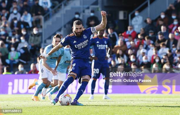 Karim Benzema of Real Madrid scores their second goal from the penalty spot during the LaLiga Santander match between RC Celta de Vigo and Real...