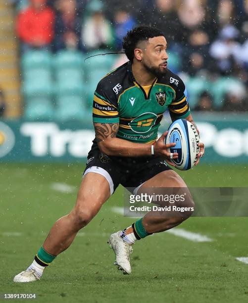 Matt Proctor of Northampton Saints runs with the ball during the Gallagher Premiership Rugby match between Northampton Saints and Bristol Bears at...