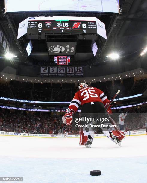 Andrew Hammond of the New Jersey Devils leaves the net after giving up an overtime goal to the Florida Panthers at the Prudential Center on April 02,...