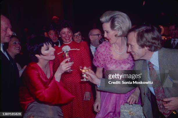 View of American actor Liza Minnelli , socialite Dina Merrill , and talk show host Dick Cavett as they attend an unspecified event, New York, New...