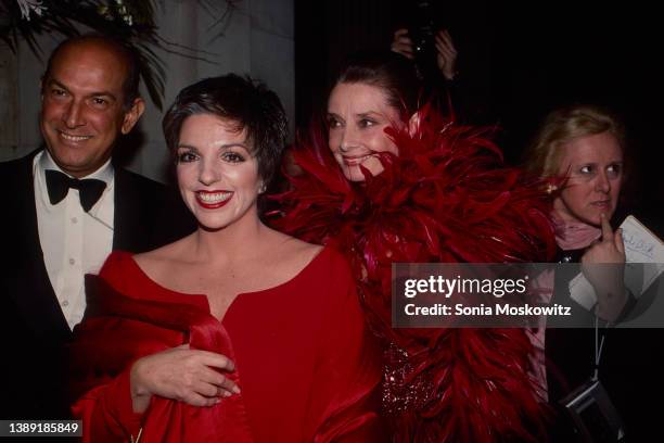 View of, from left, Dominican fashion designer Oscar de la Renta and actors Liza Minnelli & Audrey Hepburn as they attend the eighth annual CFDA...
