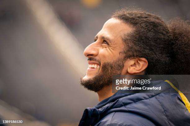 Colin Kaepernick interacts with fans during the Michigan spring football game at Michigan Stadium on April 2, 2022 in Ann Arbor, Michigan. Kaepernick...