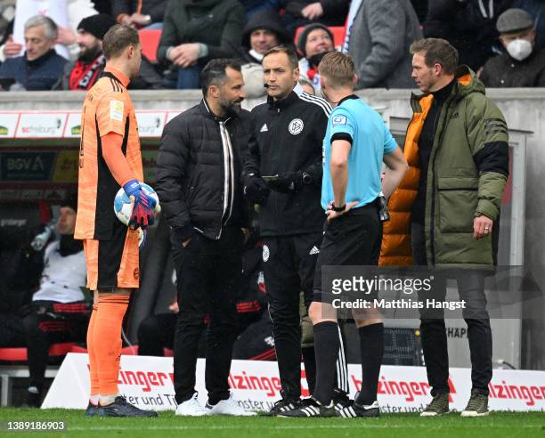 Sporting director Hasan Salihamidzic of FC Bayern Muenchen, referee Christian Dingert, 4th Official Arno Blos and Head coach Julian Nagelsmann of FC...
