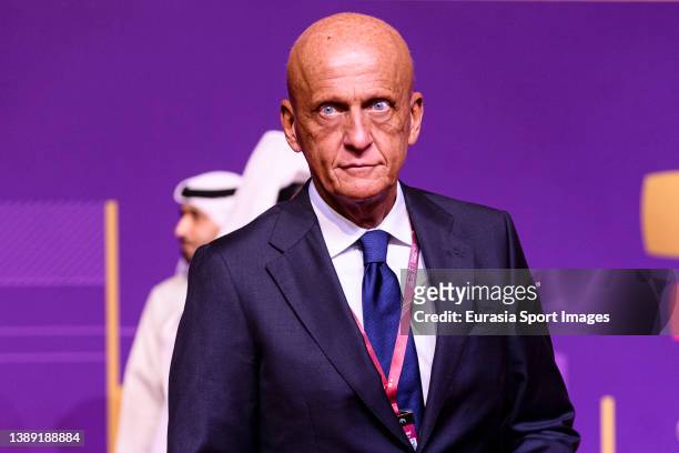 Pierluigi Collina former professional football referee poses for photos on the red carpet during the FIFA World Cup Qatar 2022 Final Draw at Doha...