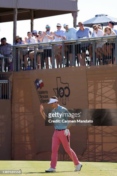 Beau Hossler acknowledges the crowd on the 16th tee during the third round of the Valero Texas Open at TPC San Antonio on April 02, 2022 in San...