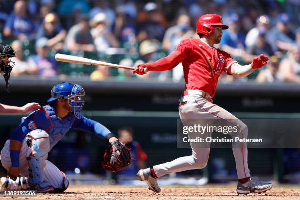 Tyler Wade of the Los Angeles Angels hits a single against the Chicago Cubs during the third inning of the MLB spring training game at Sloan Park on...