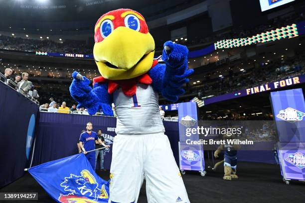 The Kansas Jayhawks mascot runs out to the court before the game against the Villanova Wildcats in the semifinal game of the 2022 NCAA Men's...
