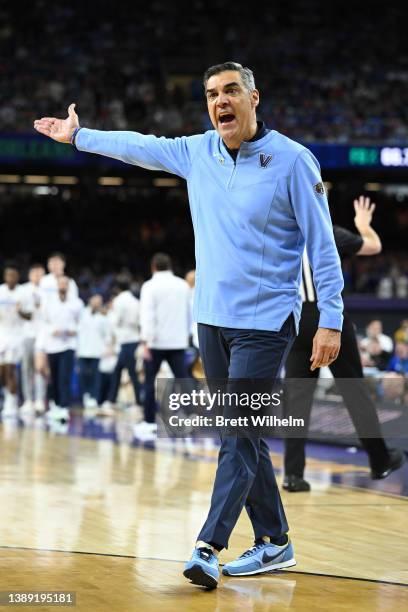 Head coach Jay Wright of the Villanova Wildcats coaches reacts during the game against the Kansas Jayhawks in the semifinal game of the 2022 NCAA...