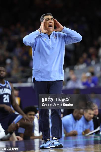 Head coach Jay Wright of the Villanova Wildcats looks on in the first half of the game against the Kansas Jayhawks during the 2022 NCAA Men's...