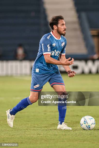 Matias Zunino of Nacional drives the ball during a match between Nacional and Plaza Colonia as part of Torneo Apertura 2022 at Gran Parque Central on...