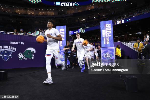 Kansas Jayhawks warm-up for Men's Final Four game wearing adidas "More Is Possible" tees as part of adidas’ NIL announcement which celebrates the...