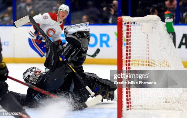 Brian Elliott of the Tampa Bay Lightning makes a save in the first period during a game against the Montreal Canadiens at Amalie Arena on April 02,...