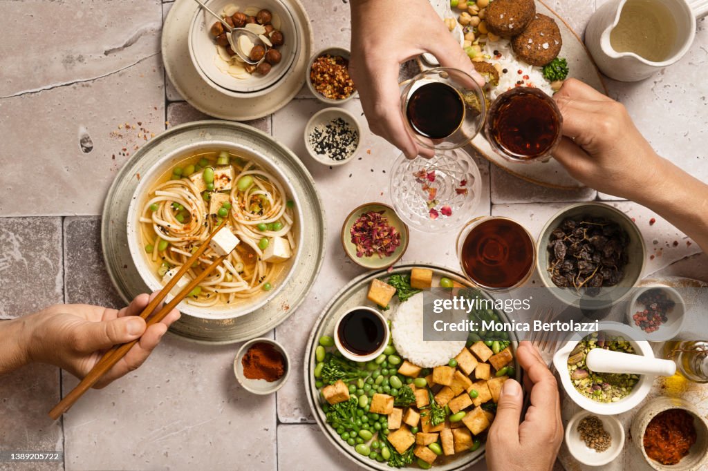 Large table view of vegan take away foods