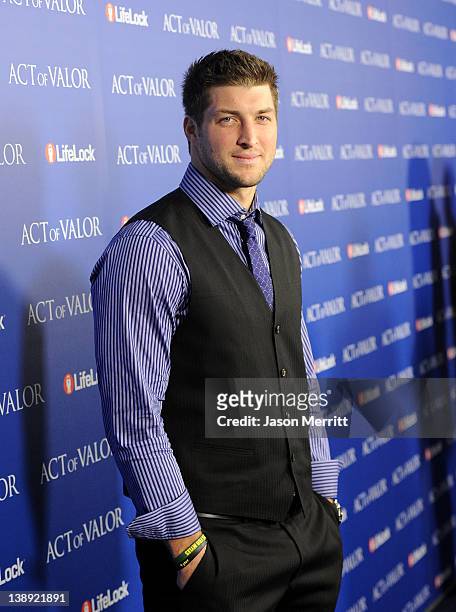 Player Tim Tebow of the Denver Broncos arrives at the premiere of Relativity Media's "Act Of Valor" held at ArcLight Cinemas on February 13, 2012 in...