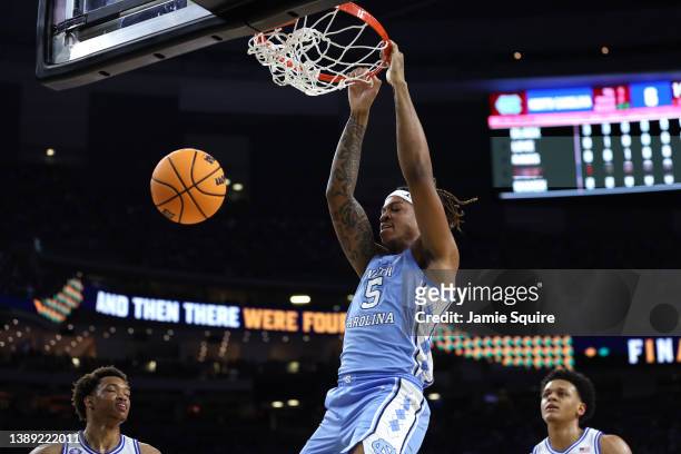 Armando Bacot of the North Carolina Tar Heels dunks against the Duke Blue Devils in the first half of the game during the 2022 NCAA Men's Basketball...