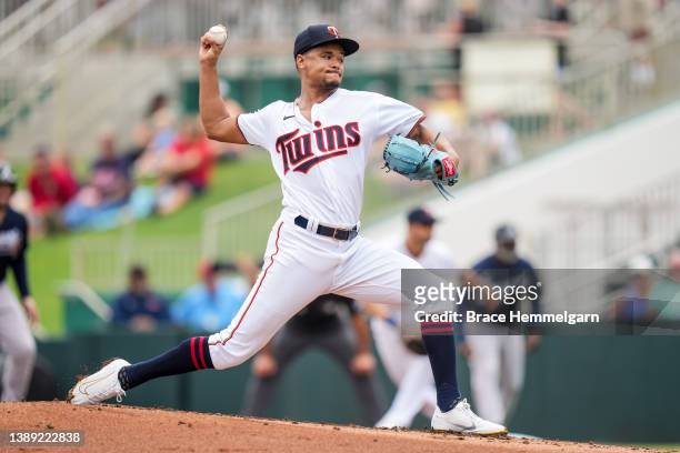 Chris Archer of the Minnesota Twins pitches during a spring training game against the Atlanta Braves on April 1, 2022 at the Hammond Stadium in Fort...