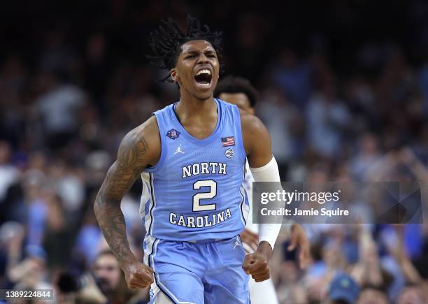 Caleb Love of the North Carolina Tar Heels reacts in the second half of the game against the Duke Blue Devils during the 2022 NCAA Men's Basketball...
