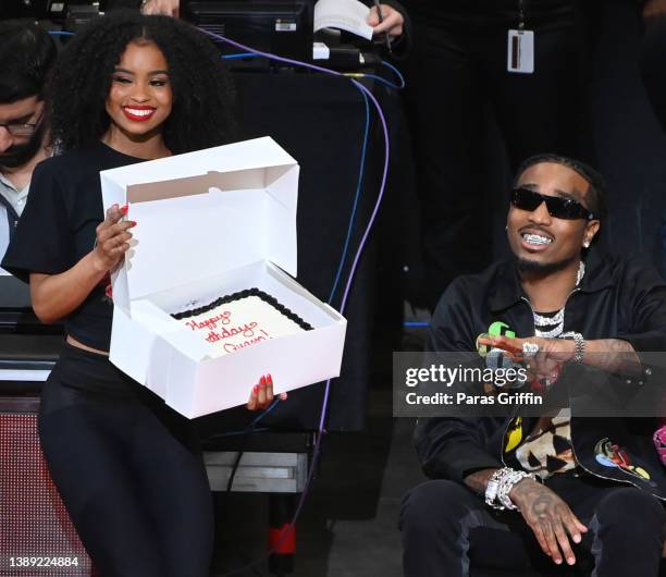 Quavo is presented with birthday cake during the game between Brooklyn Nets and the Atlanta Hawks at State Farm Arena on April 02, 2022 in Atlanta,...